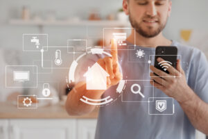 A person performing automations on a glass screen